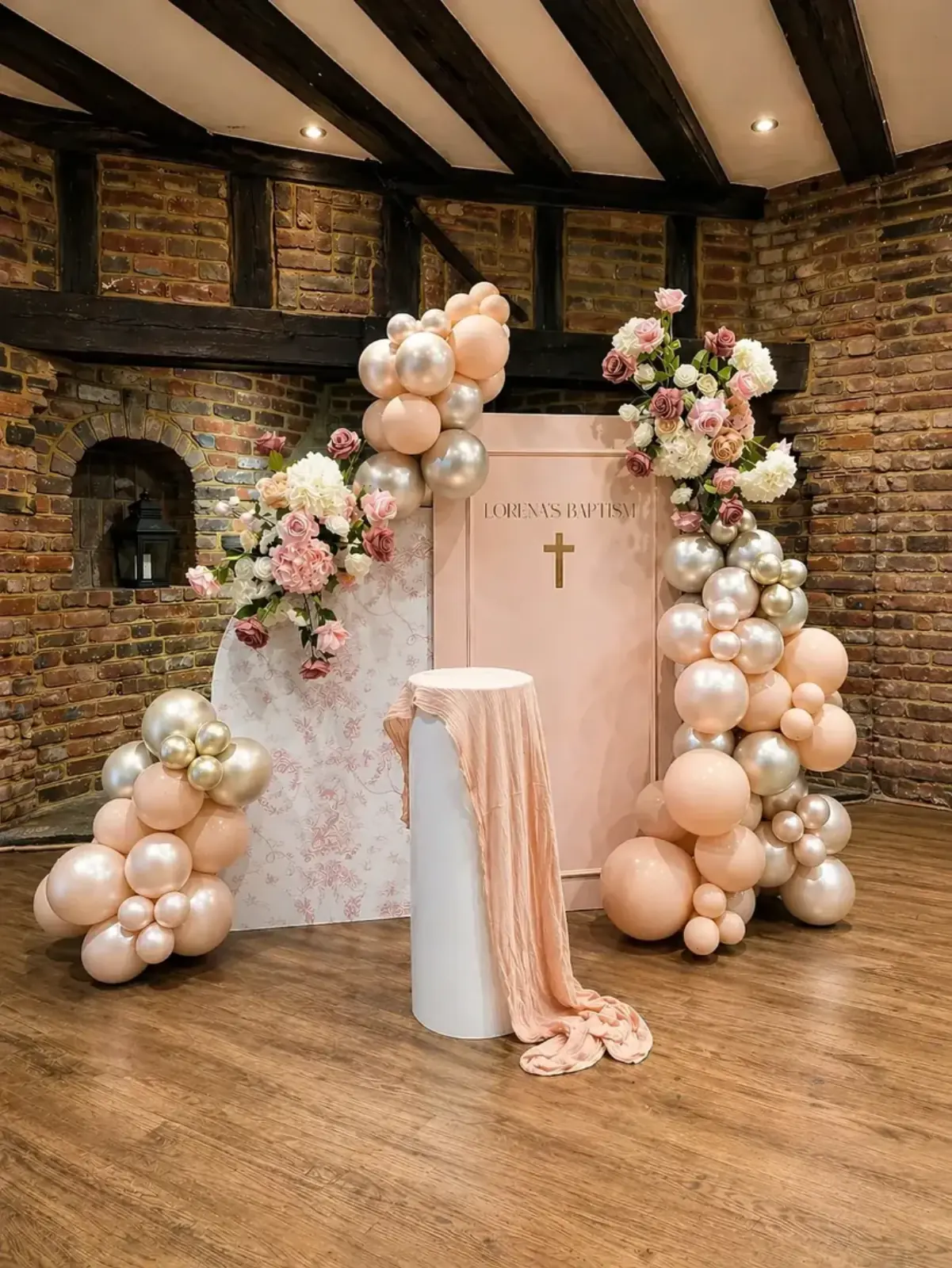 Christening styling in Cobham Surrey by River Fox Events — soft ivory and blush balloon installation with floral accents