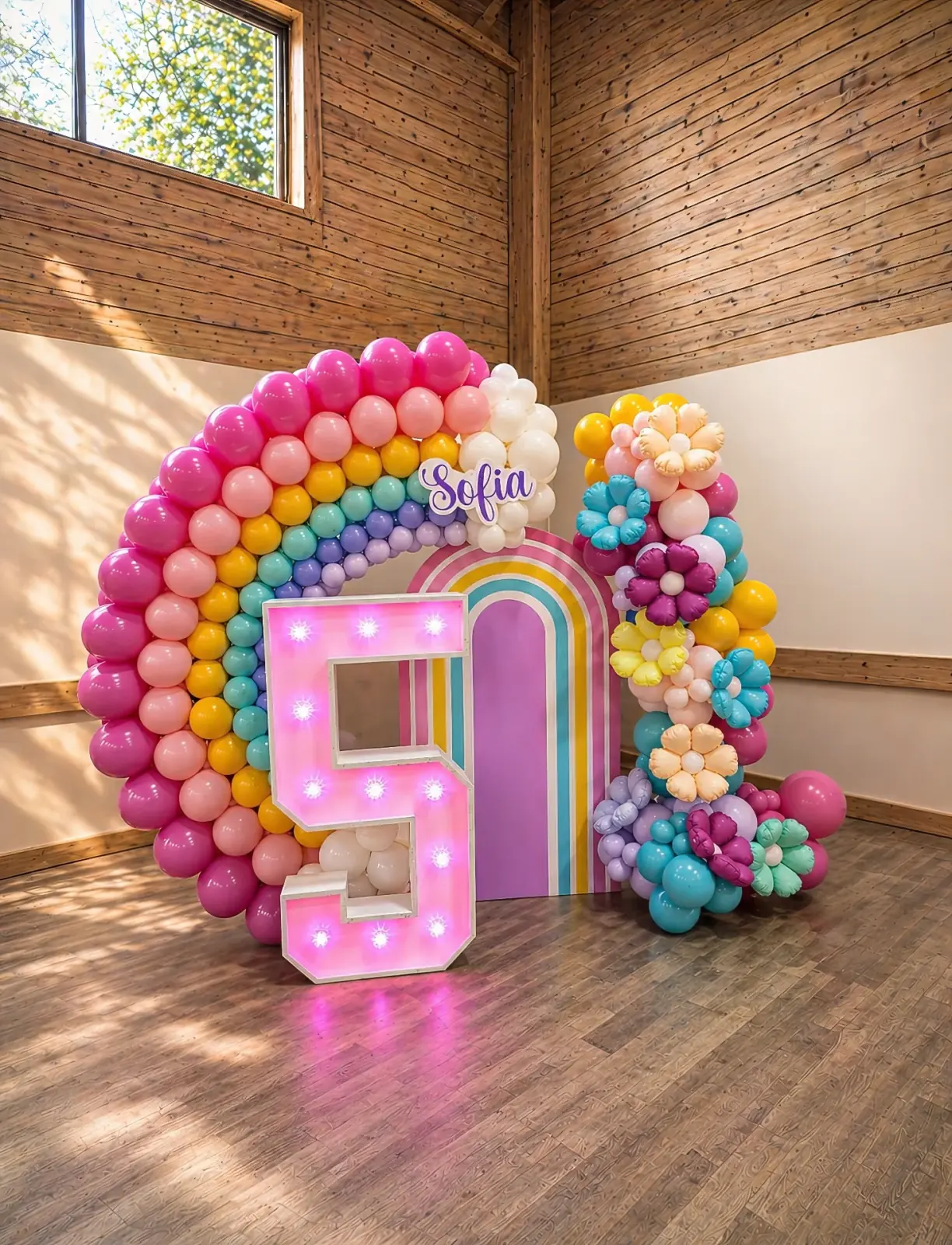 Bespoke event styling in Cobham by River Fox Events — pastel balloon installation with organic textures and soft floral accents