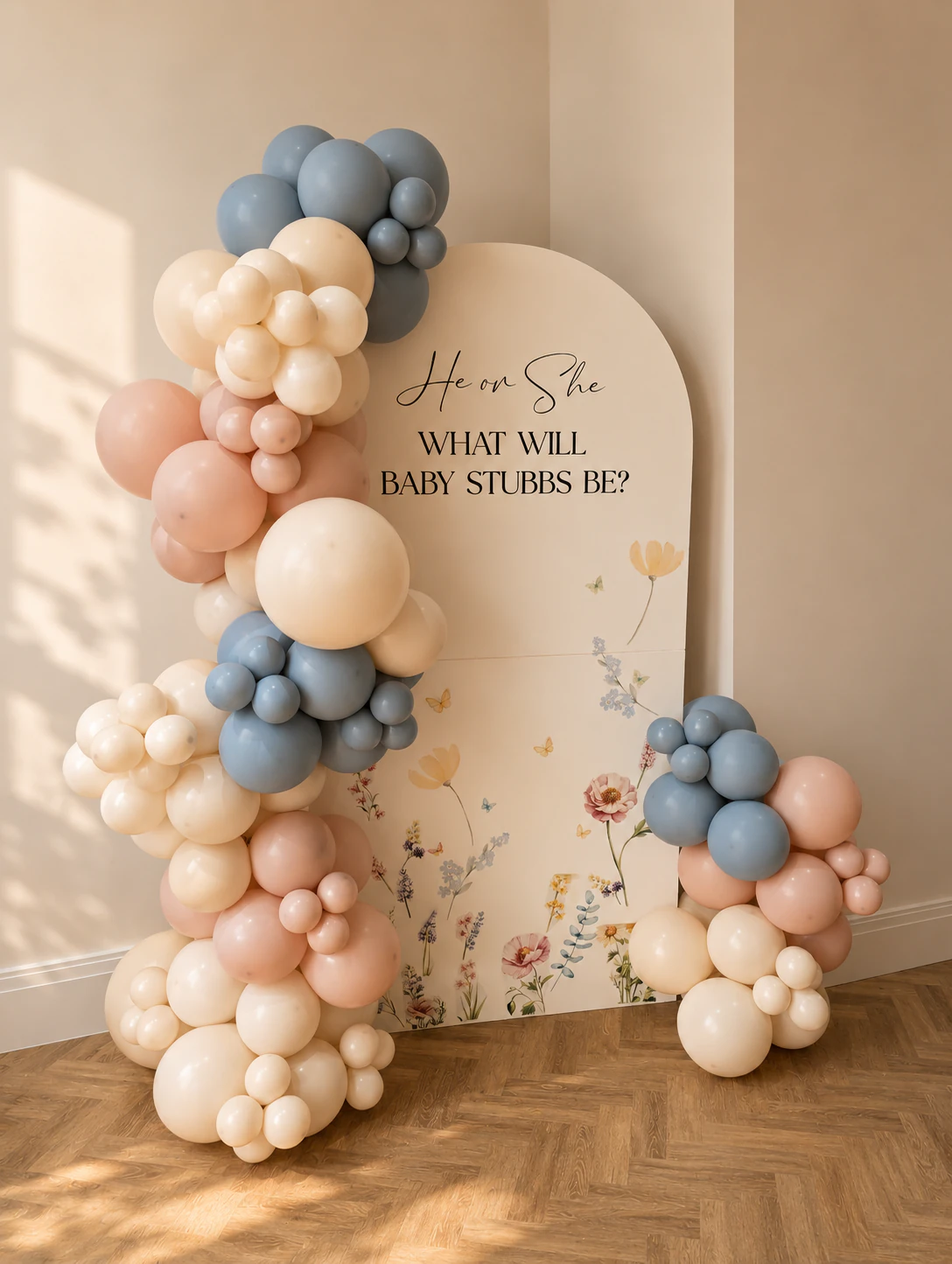 He or she balloon arch in soft blue and pink for the Stubbs family gender reveal styled in Surrey by River Fox Events
